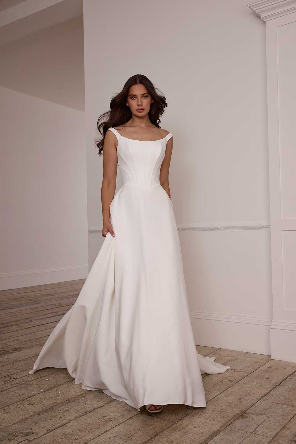 Suzanne Neville Fittonia bateau neck wedding dress with straps at Miss Bush bridal boutique in Surrey