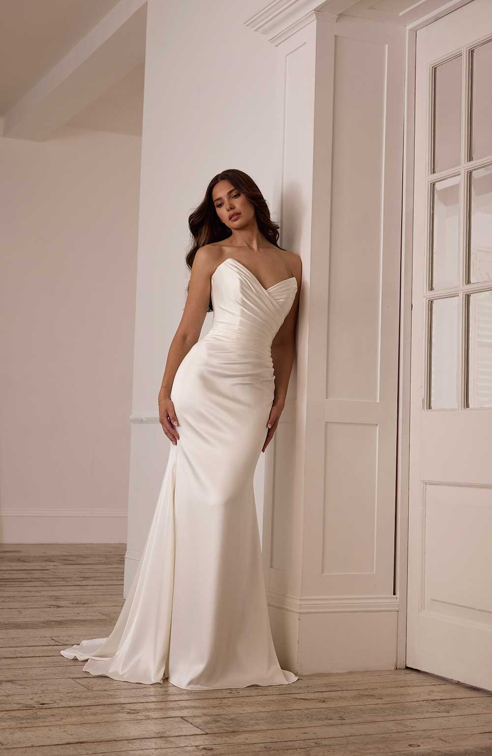 Suzanne Neville Saffron strapless ruched satin wedding dress at Miss Bush bridal boutique in Surrey